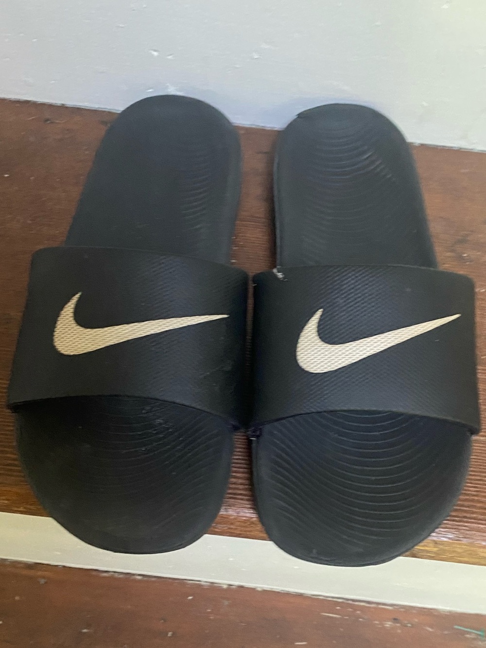 Nike Kids Black Slide Sandals with Cream Swoosh